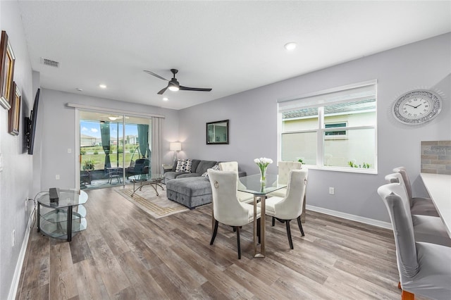 10427 SW 98th Place Rd, Ocala, FL 34481 - dining room with wood finished floors, ceiling fan, baseboards, and recessed lighting