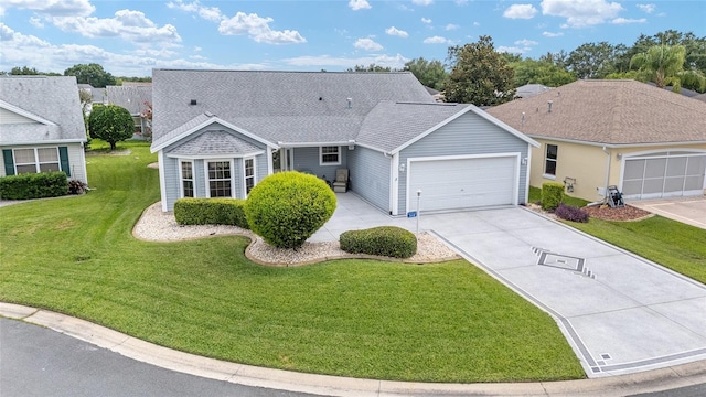 2608 Casso Ct, The Villages, FL 32162 - view of front of house with an attached garage, concrete driveway, and a front lawn