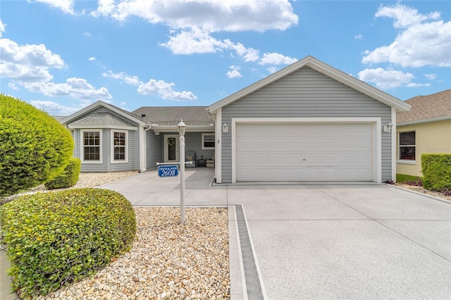 2608 Casso Ct, The Villages, FL 32162 - ranch-style home with a garage and driveway
