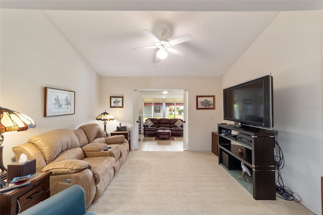 2608 Casso Ct, The Villages, FL 32162 - living area with a ceiling fan, light carpet, a textured ceiling, and lofted ceiling