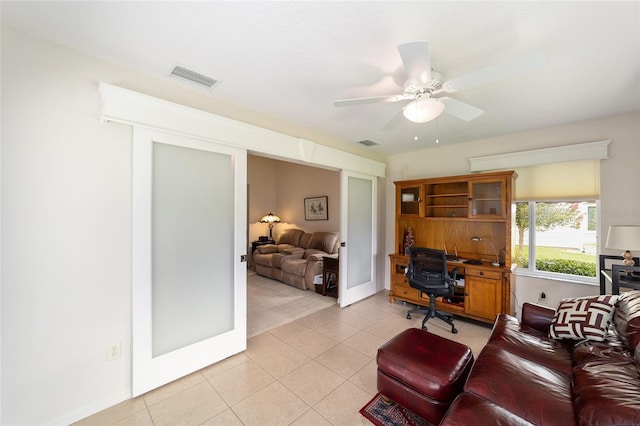 2608 Casso Ct, The Villages, FL 32162 - living room with an office area, light tile patterned floors, and ceiling fan
