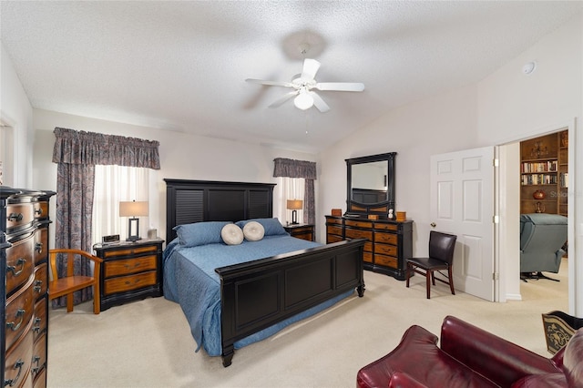 2608 Casso Ct, The Villages, FL 32162 - bedroom featuring light colored carpet, vaulted ceiling, and a ceiling fan