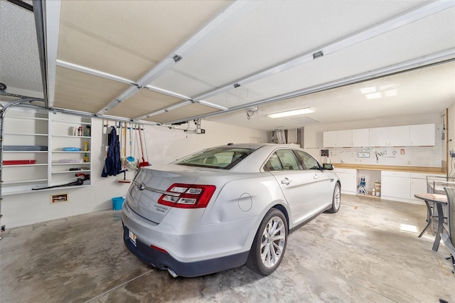 2608 Casso Ct, The Villages, FL 32162 - garage with a garage door opener