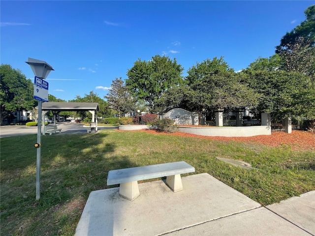 3705 SW 27th St Unit 621, Gainesville, FL 32608 - view of community with a lawn