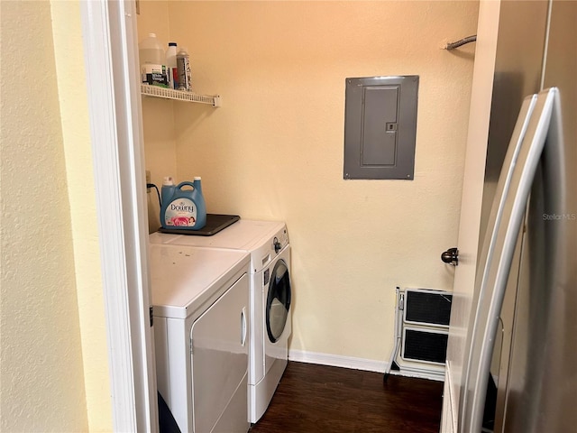 3705 SW 27th St Unit 621, Gainesville, FL 32608 - washroom featuring electric panel, independent washer and dryer, dark wood-type flooring, and baseboards