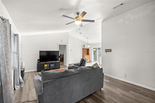9 Juniper Pass Trl, Ocala, FL 34480 - living room with lofted ceiling, a ceiling fan, wood finished floors, and baseboards