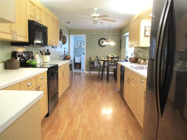 13762 SW 112th Ter, Dunnellon, FL 34432 - kitchen featuring black appliances, light brown cabinets, light wood finished floors, a ceiling fan, and light countertops