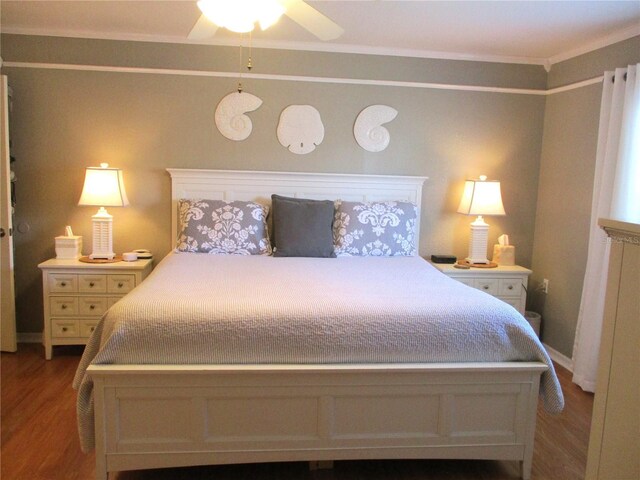 13762 SW 112th Ter, Dunnellon, FL 34432 - bedroom featuring wood finished floors, a ceiling fan, and ornamental molding