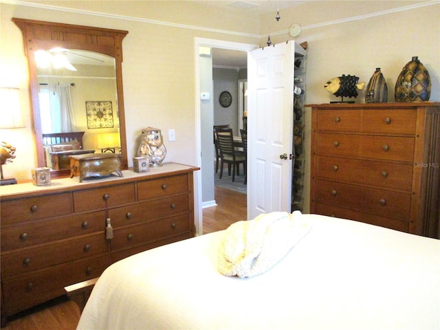 13762 SW 112th Ter, Dunnellon, FL 34432 - bedroom with dark wood-style flooring and baseboards