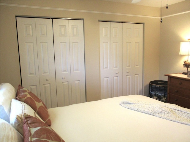 13762 SW 112th Ter, Dunnellon, FL 34432 - bedroom featuring multiple closets and ornamental molding