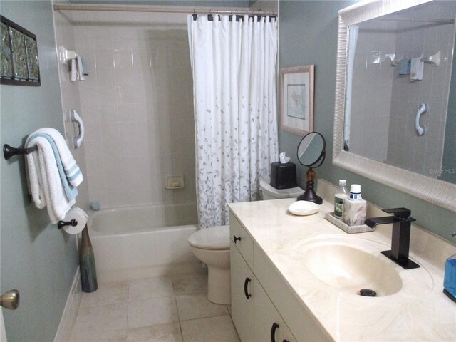 13762 SW 112th Ter, Dunnellon, FL 34432 - full bathroom featuring tile patterned floors, toilet, shower / tub combo, vanity, and baseboards