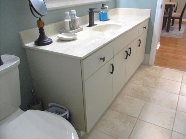 13762 SW 112th Ter, Dunnellon, FL 34432 - half bath with toilet, tile patterned floors, and vanity