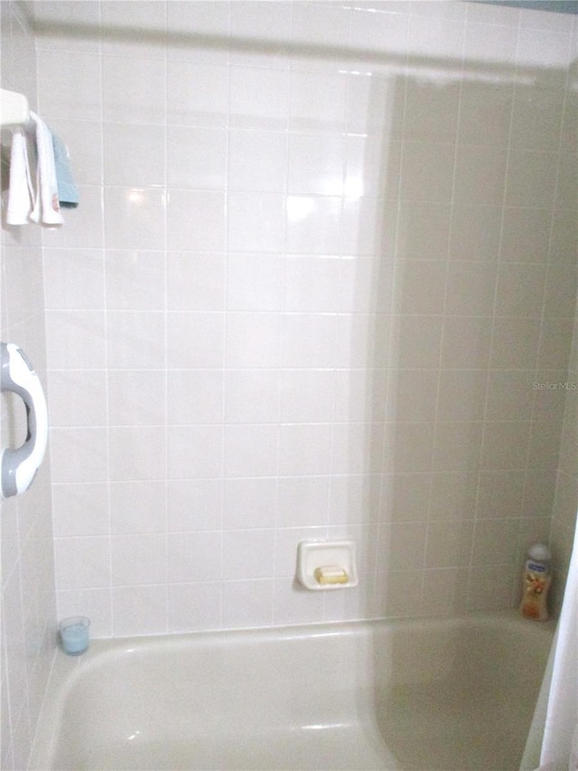 13762 SW 112th Ter, Dunnellon, FL 34432 - bathroom featuring washtub / shower combination