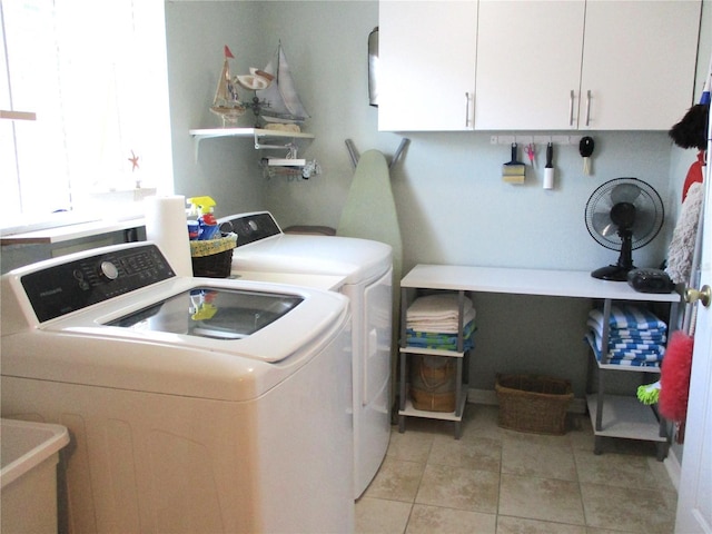 13762 SW 112th Ter, Dunnellon, FL 34432 - laundry area with washer and dryer and light tile patterned flooring