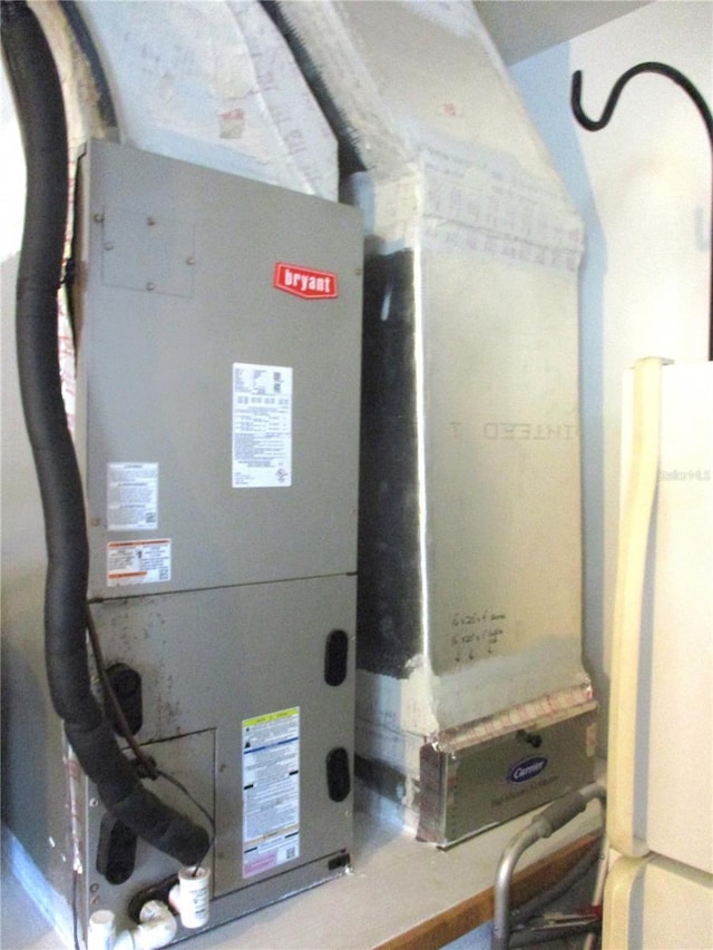 13762 SW 112th Ter, Dunnellon, FL 34432 - utility room with heating unit
