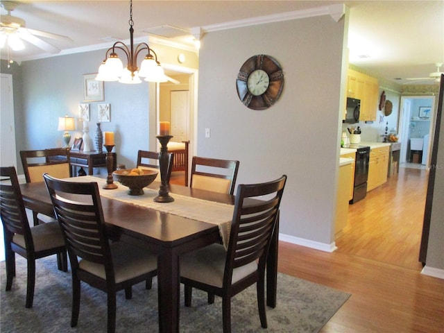 13762 SW 112th Ter, Dunnellon, FL 34432 - dining space featuring ornamental molding, light wood finished floors, a ceiling fan, and baseboards