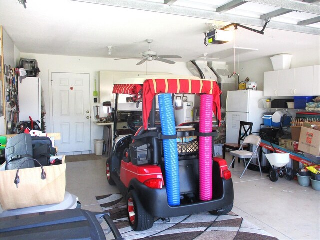 13762 SW 112th Ter, Dunnellon, FL 34432 - garage featuring freestanding refrigerator, a ceiling fan, and a garage door opener