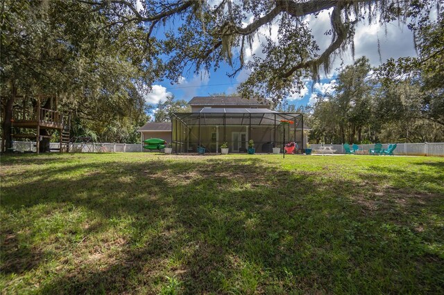 9709 E Baymeadows Dr, Inverness, FL 34450 - view of yard with a lanai