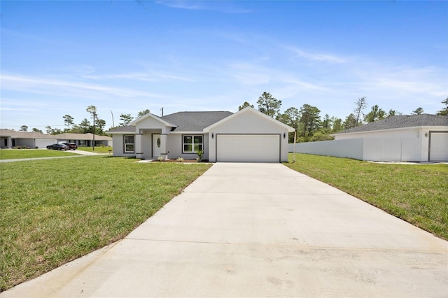 3079 SW 168th Loop, Ocala, FL 34473 - view of front of house featuring an attached garage, driveway, and stucco siding