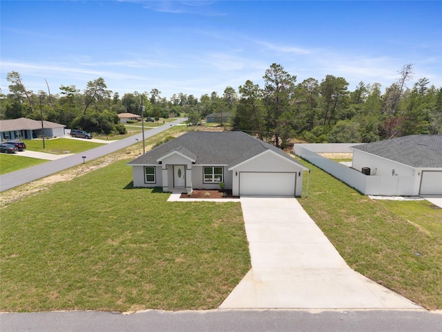 3079 SW 168th Loop, Ocala, FL 34473 - single story home featuring driveway, a garage, and roof with shingles