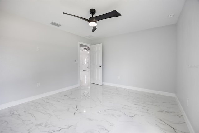 3079 SW 168th Loop, Ocala, FL 34473 - unfurnished room with ceiling fan, marble look tile flooring, and a smoke detector