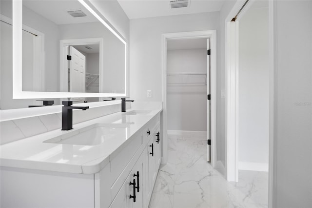 3079 SW 168th Loop, Ocala, FL 34473 - full bath featuring marble finish flooring, double vanity, and a walk in closet