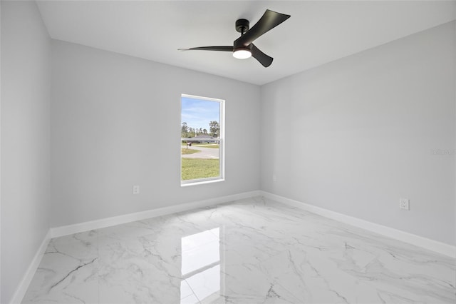 3079 SW 168th Loop, Ocala, FL 34473 - empty room with marble look tile flooring and a ceiling fan