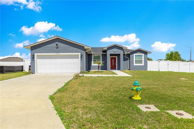 10291 SE 67th Ter, Belleview, FL 34420 - ranch-style house with concrete driveway, a garage, and stucco siding