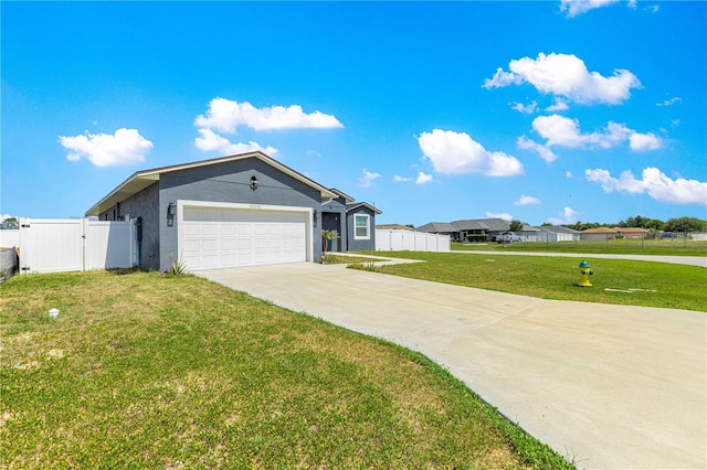 10291 SE 67th Ter, Belleview, FL 34420 - ranch-style home featuring concrete driveway, an attached garage, a gate, and stucco siding