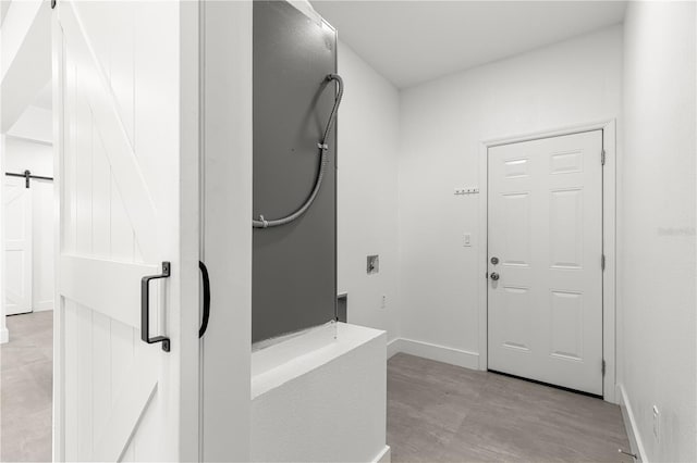 10291 SE 67th Ter, Belleview, FL 34420 - entryway with baseboards and light wood-style floors