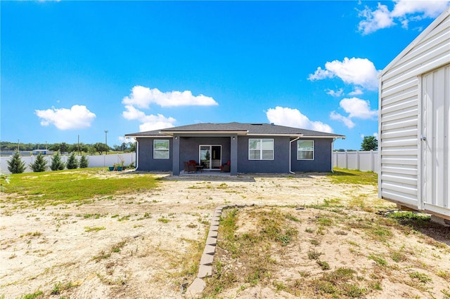 10291 SE 67th Ter, Belleview, FL 34420 - back of property featuring stucco siding