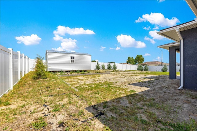 10291 SE 67th Ter, Belleview, FL 34420 - fenced backyard with an outbuilding