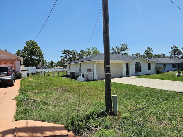6 Bahia Trace Loop, Ocala, FL 34472 - view of front of home with concrete driveway, an attached garage, stucco siding, and cooling unit