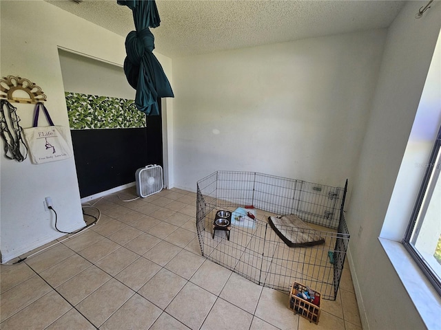 6 Bahia Trace Loop, Ocala, FL 34472 - unfurnished dining area with a textured ceiling, light tile patterned floors, and baseboards