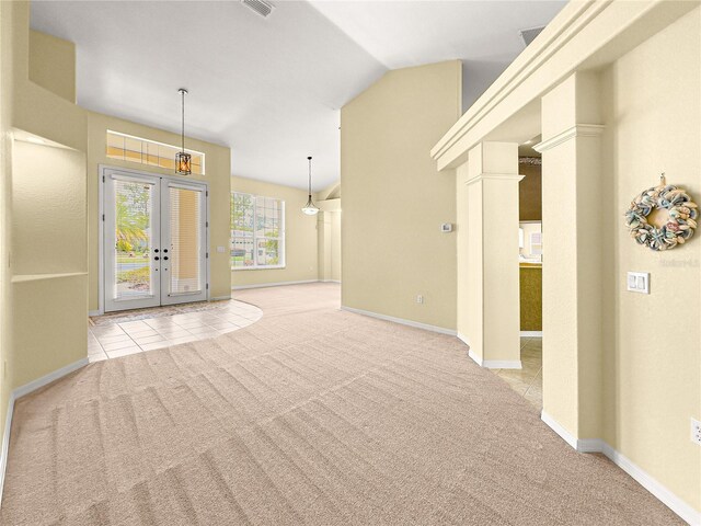28 Golf View Dr, Ocala, FL 34472 - tiled empty room with carpet floors, vaulted ceiling, and baseboards