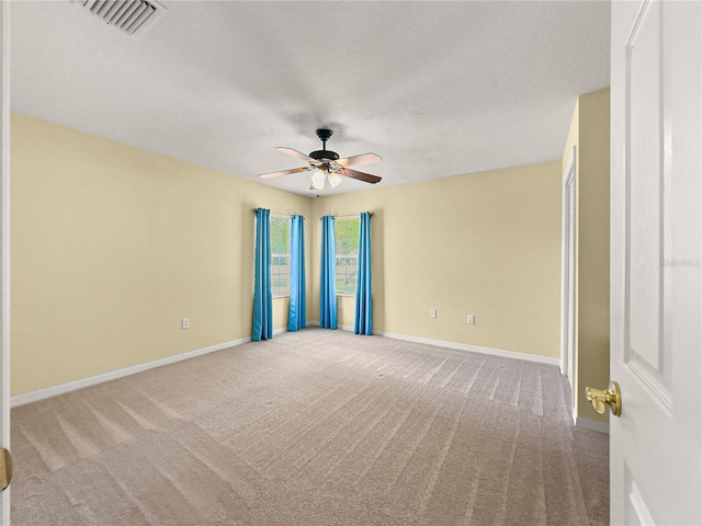 28 Golf View Dr, Ocala, FL 34472 - spare room featuring carpet floors, ceiling fan, and baseboards
