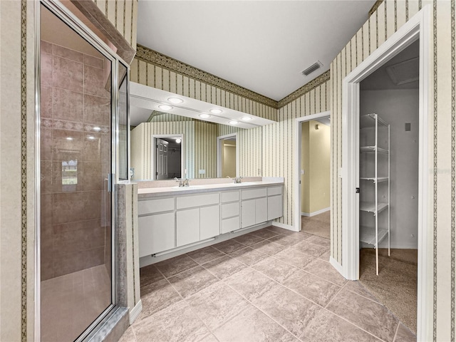 28 Golf View Dr, Ocala, FL 34472 - bathroom with wallpapered walls, a shower stall, double vanity, and tile patterned floors