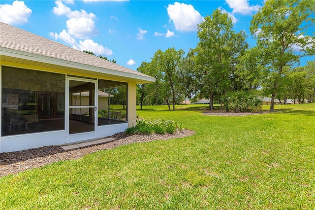 28 Golf View Dr, Ocala, FL 34472 - view of grassy yard with a sunroom