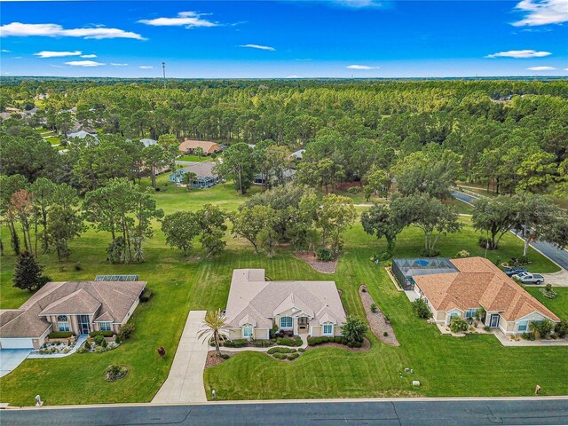 28 Golf View Dr, Ocala, FL 34472 - aerial view of property and surrounding area featuring a heavily wooded area