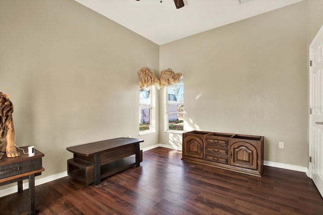 sitting room featuring baseboards, dark wood-style flooring, ceiling fan, and lofted ceiling