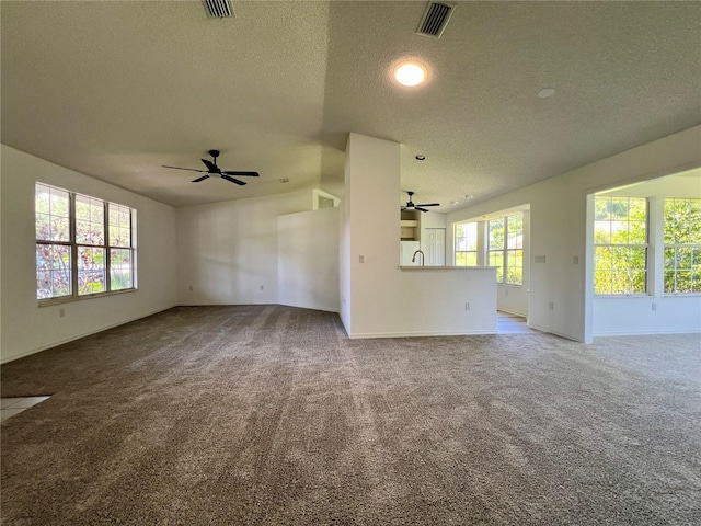8239 SW 108th St, Ocala, FL 34481 - unfurnished living room featuring a ceiling fan, a textured ceiling, carpet flooring, a sink, and baseboards