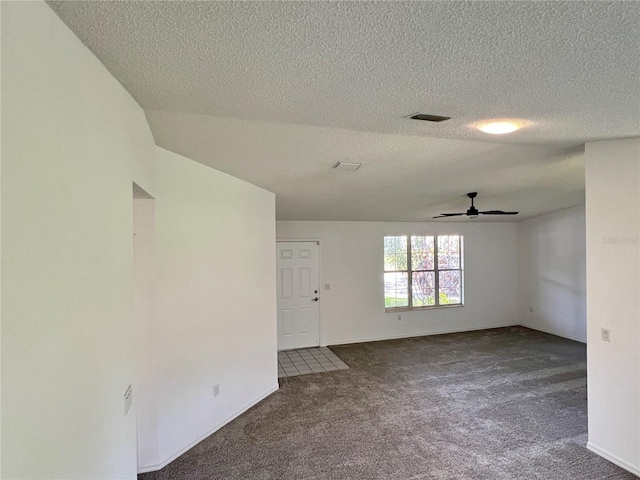 8239 SW 108th St, Ocala, FL 34481 - empty room featuring carpet floors, ceiling fan, a textured ceiling, and baseboards