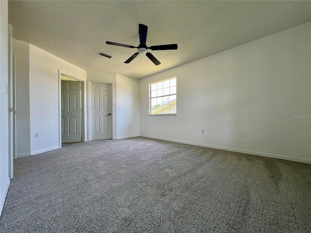 8239 SW 108th St, Ocala, FL 34481 - unfurnished bedroom featuring carpet floors, a textured ceiling, baseboards, and ceiling fan