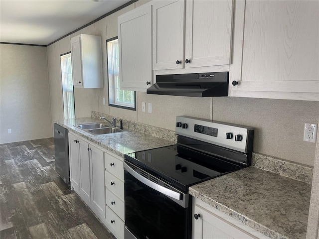 15807 NE 10th St, Williston, FL 32696 - kitchen featuring under cabinet range hood, appliances with stainless steel finishes, a sink, white cabinets, and dark wood-type flooring