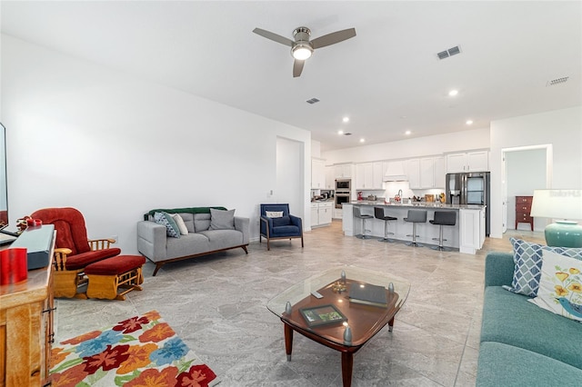 6046 SW 86th Cir, Ocala, FL 34481 - living room featuring a ceiling fan and recessed lighting