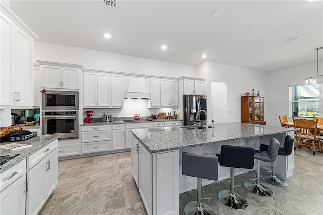 6046 SW 86th Cir, Ocala, FL 34481 - kitchen featuring appliances with stainless steel finishes, premium range hood, a sink, white cabinetry, and recessed lighting