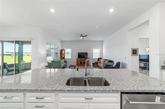 6046 SW 86th Cir, Ocala, FL 34481 - kitchen with a sink, dishwasher, open floor plan, a ceiling fan, and plenty of natural light