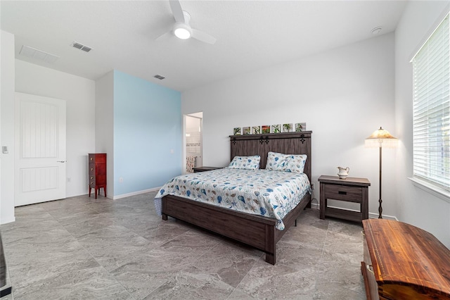 6046 SW 86th Cir, Ocala, FL 34481 - bedroom featuring a ceiling fan, baseboards, and ensuite bathroom