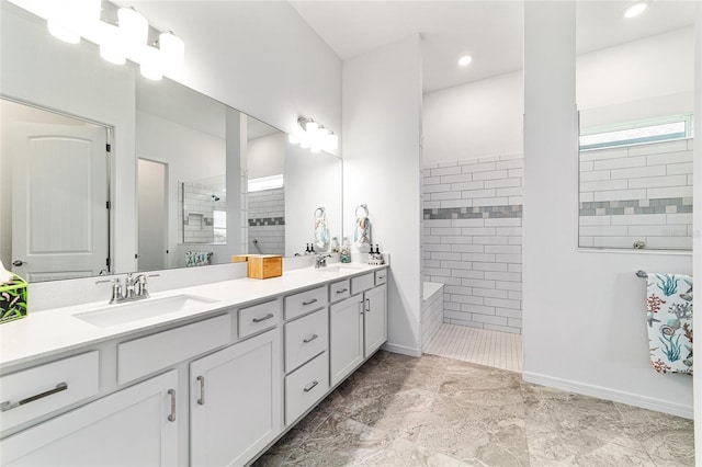 6046 SW 86th Cir, Ocala, FL 34481 - bathroom with walk in shower, double vanity, and baseboards