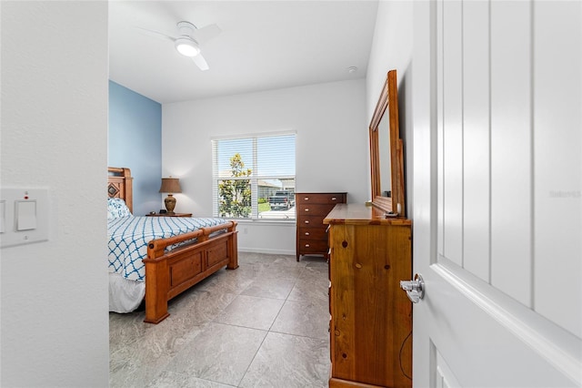 6046 SW 86th Cir, Ocala, FL 34481 - bedroom with light tile patterned floors and ceiling fan